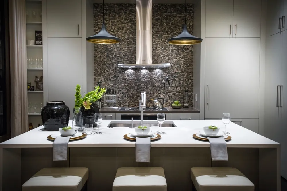 Kitchen island with pendant lights and bar stools